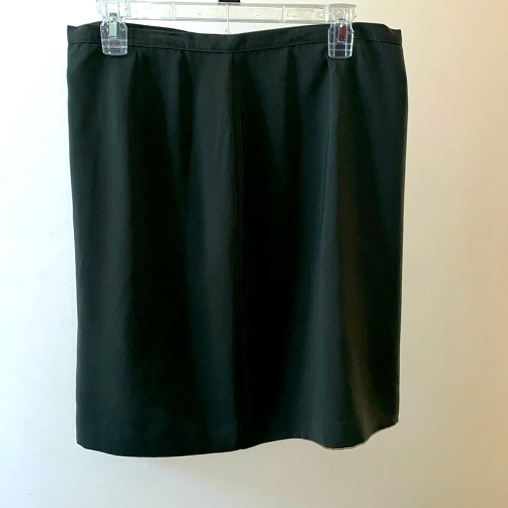 Dark navy dress bar skirt. Knee length and washable. Fully lined.